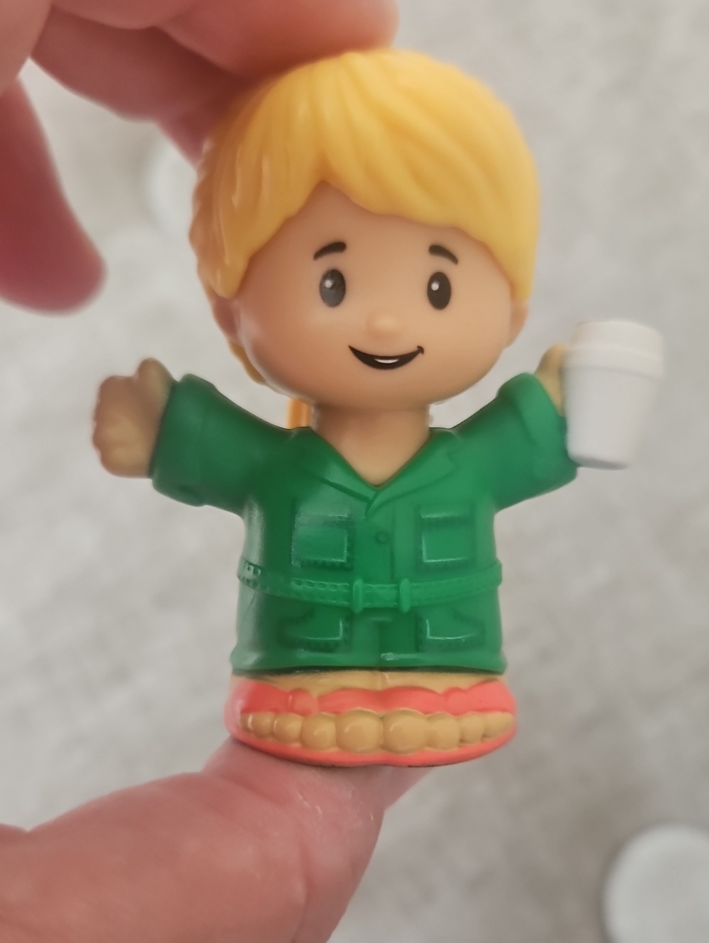 Fisher-Price Little People figure featuring a character with blonde hair